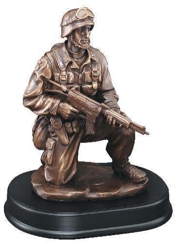 Soldier Kneeling With Rifle Down