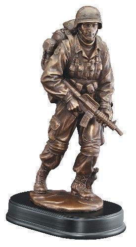 Soldier Standing Patrol With Rifle